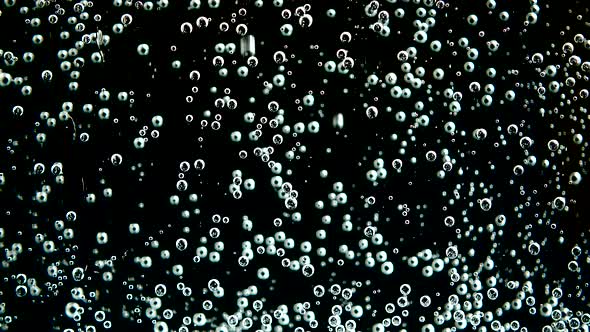 Air bubbles of the fizzy water. alt