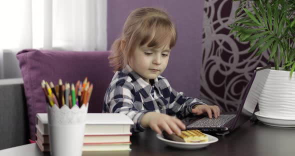 Girl Doing Online Lessons Using Digital Laptop Computer. Distance Education alt