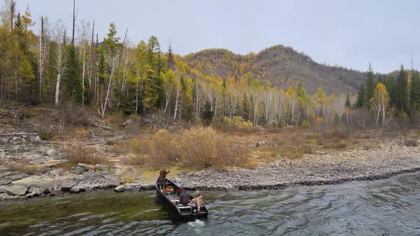 the Boat Moors To the Shore a Man with a Rope Moors the Boat on the Shore