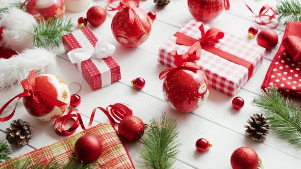 Conifer Twigs and Baubles Near Christmas Gifts alt