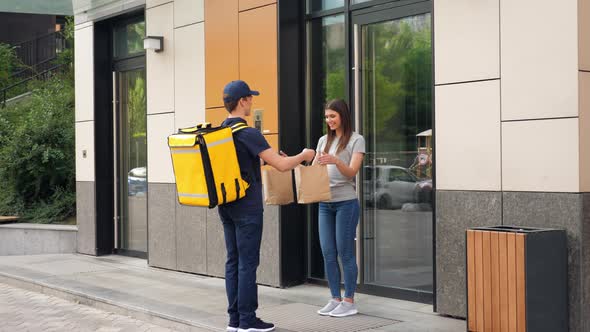 Smiling Food Delivery Man Courier with Thermal Backpack Deliver Order Woman alt