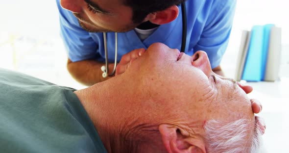 Male paramedic during cardiopulmonary resuscitation alt