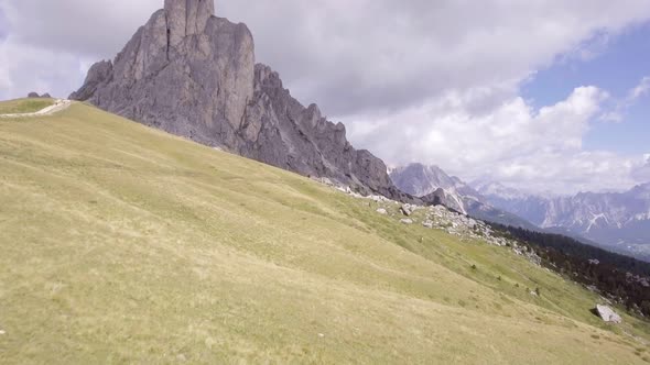 Aerial Flight Above Mountain Top in Sunny Day alt