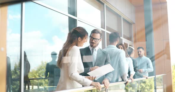 Young Designers Talking on Break About Business Plans alt