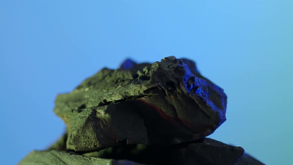 Wood charcoal. Black Charcoal on Blue green screen background. Used for cooking grill or industries.