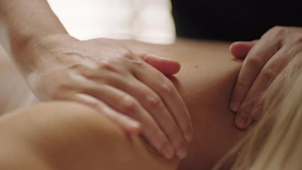 Massage of Neck Collar Zone in Chiropractic Clinic Closeup View of Physician Hands on Body of alt