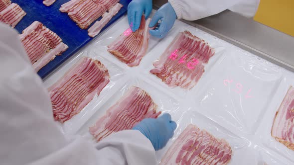 Process of Weighing Sliced Bacon Before Packaging