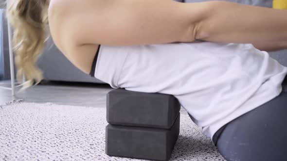 Professional Yoga Trainer Practices Morning Exercises By Bed