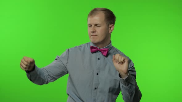 Handsome Man Moving in Dance, Smiling Carefree, Trends, Gesture of Success, Celebrate. Chroma Key alt