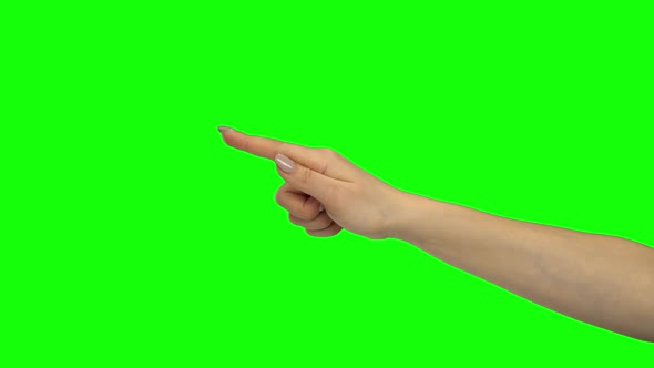 Arm of Female Indicating Two Items. Green Screen. Close Up alt