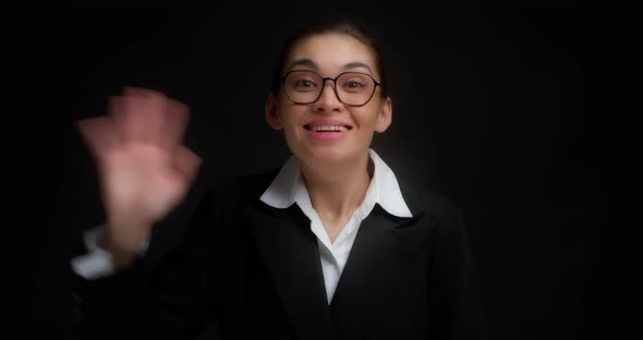 Cheerful Business Woman Waves Her Hand Very Happy to Meet