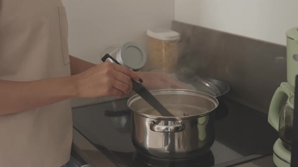 Woman Cooking Spaghetti alt