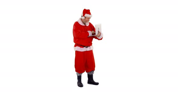 Santa claus using laptop alt