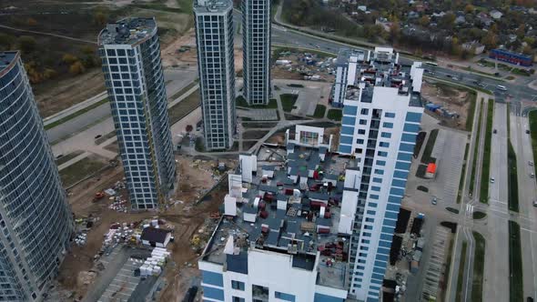Construction of modern multi-storey buildings. Construction of a new city block. alt
