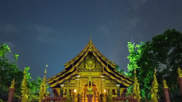 Milky way and clouds moving at night view point Wat Phra That Doi Phra Chan.
