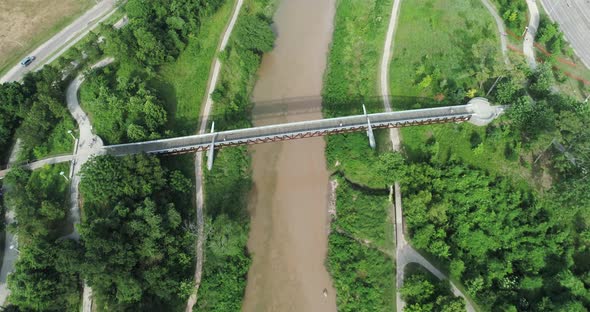 Aerial view of the Buffalo Bayou in Houston, Texas on a sunny day. This video was filmed in 4k for b alt