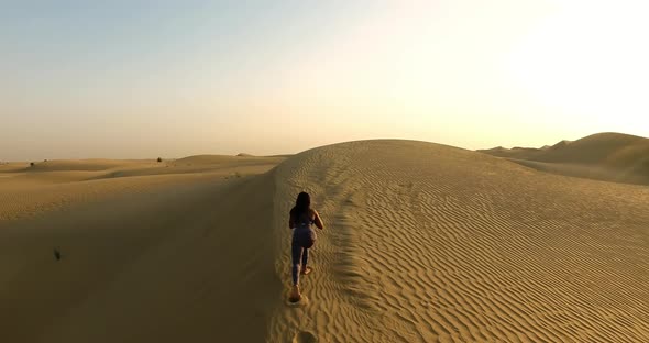 Girl Is Training in the Desert