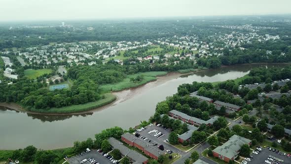 Residential Neighborhood Near a River Rooftops of Residential and Other Buildings alt