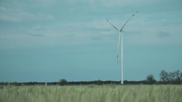 Lonely Wind Turbine in the Middle of the Field