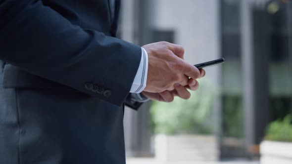Businessman Hands Holding Phone Texting Closeup alt
