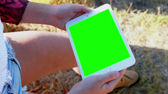 Woman using digital tablet 4k alt