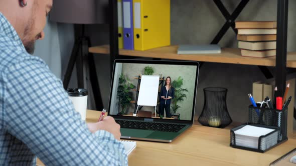 Businessman in Office Study Watch Online Education Business Course Laptop Webcam alt