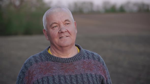 Portrait of an Elderly Man Looking at the Sunset