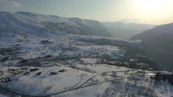 Aerial View of a Barren Winter Landscape on top of the Mountains of Norway alt