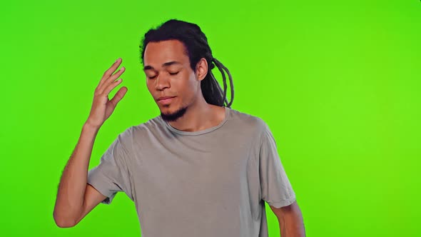 Perplexed African American Man Having Forgotten About His Girlfriend's Birthday alt