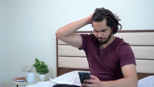 Indian man setting hairs alt
