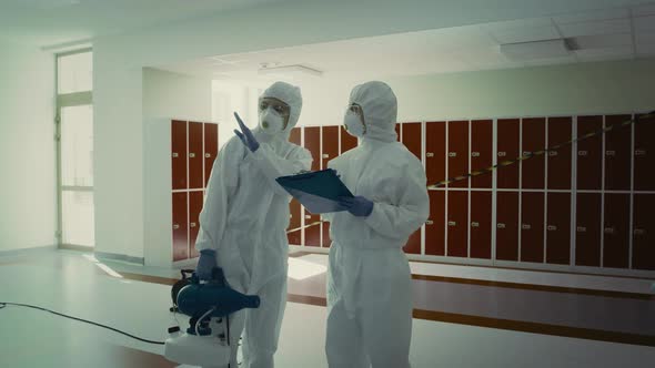 Video of inspection and disinfection of building by professional workers. alt