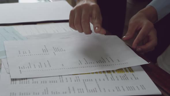 Senior man signing documents alt