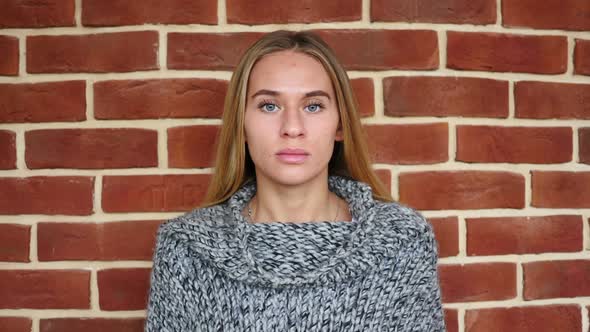 Portrait of Young Woman in Loft Office alt
