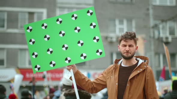 Anger Men Activists on Political Strike. People with Banner Tracking Point . alt