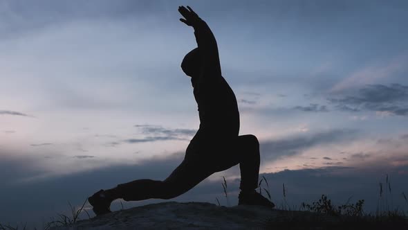 Athletic Man Goes In For Sports In Nature. Jumping Rope With Boxing alt