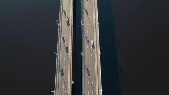 Aerial View of Bridge Over the River with Car Traffic in the City alt