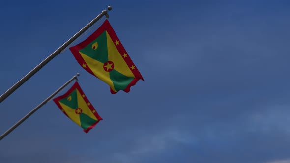 Grenada Flags In The Blue Sky - 4K