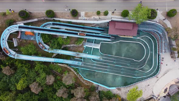Boats Plunge Into The Water At An Amusement Park alt