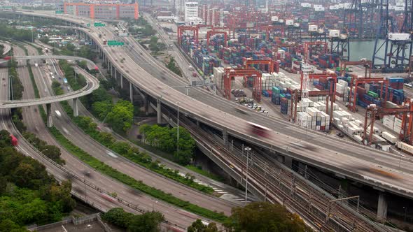 Hong Kong Container Port Terminal and Logistics Center Timelapse Pan Up alt