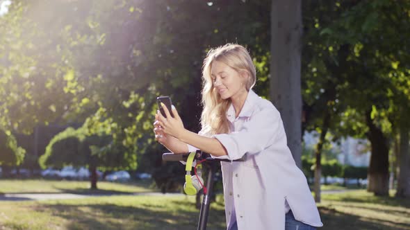 Attractive Blonde Hair Lady in the Middle of the alt