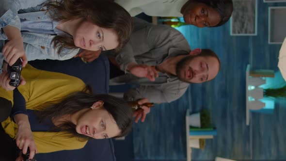 Vertical Video Front View of Women Playing Online Videogames for Gaming Competition alt