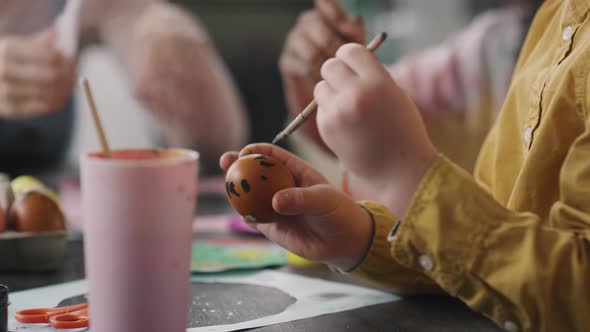 Boy Decorating Easter Egg alt