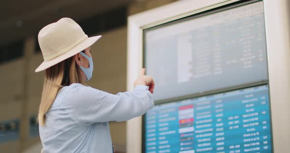 Safe Travels Under COVID-19. Slow Motion Traveling Woman, , California, USA alt