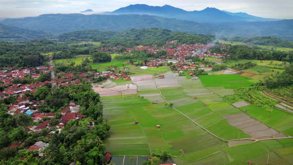 The beauty of the landscape with rice fields and hills in Sumedang, West Java, Indonesia