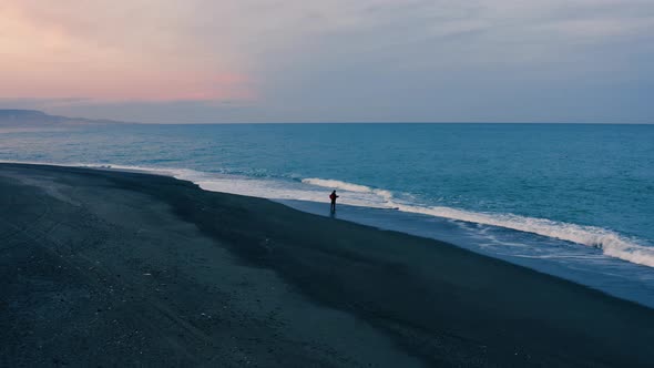 Fisherman on the Beach after Sunset alt