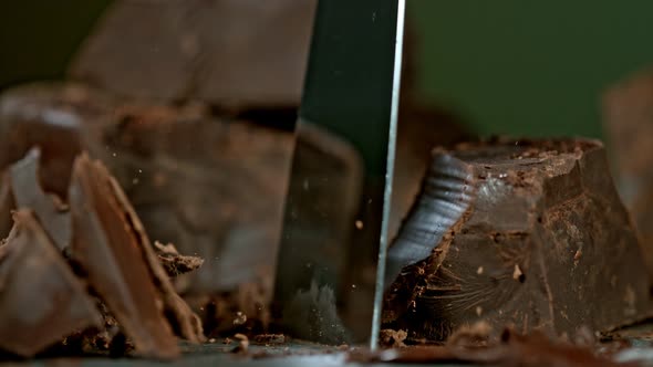 Super Slow Motion Shot of Cutting Raw Chocolate Chunk at 1000 Fps alt