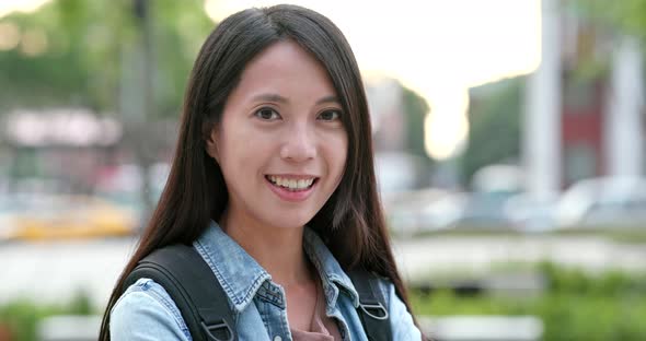 Asian woman smile to camera alt