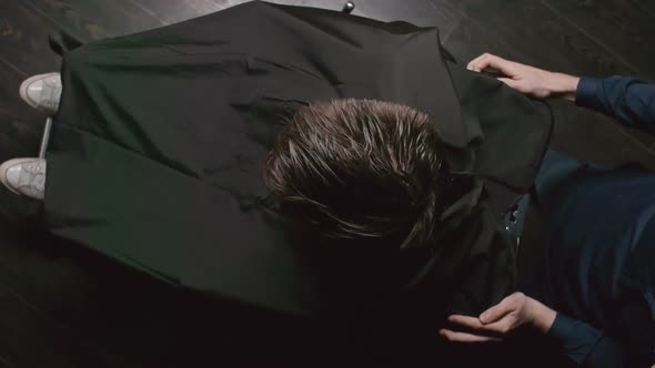 Covering Client with Barber Cloth alt