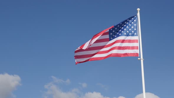 Unites States of America flag in front of blue sky floating on wind 4K ...