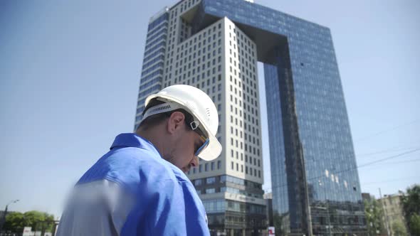 Portrait of a Successful Young Handsome Engineer, Architect, Builder, Businessman alt